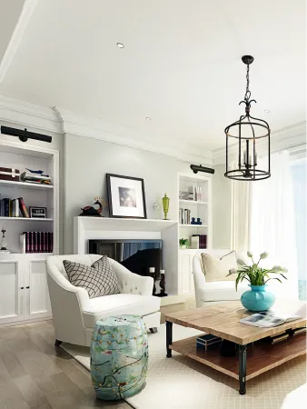 Bright living room with neutral walls, white trim, and crown molding, showcasing the transformative power of Bay Breeze Painting Company's interior painting services.