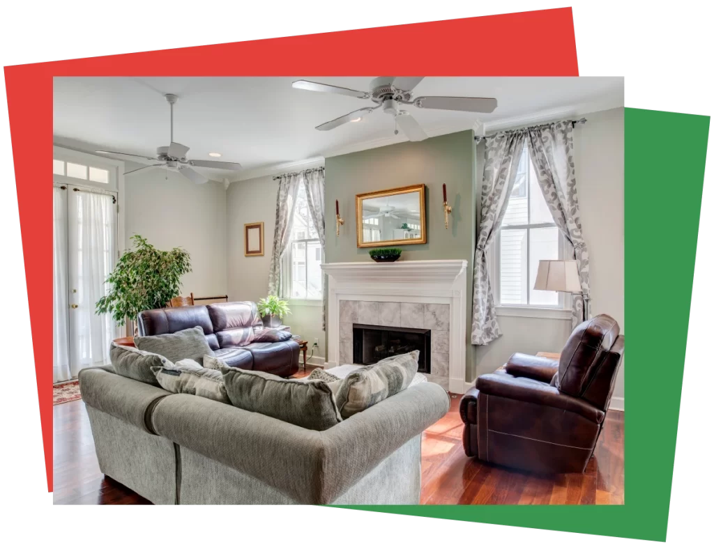 Elegant living room with soft green walls, white trim, and a fireplace, featured as the hero image of Bay Breeze Painting Company's interior painting service page.