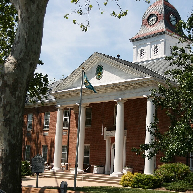 Historic Caroline County Courthouse building in Denton, Maryland, with classic red brick architecture