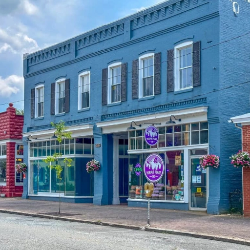 Colorful storefronts along Market Street in downtown Denton, Maryland.