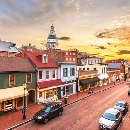 Main Street in Queenstown, Maryland, with historic buildings, tree-lined sidewalks, and small-town charm